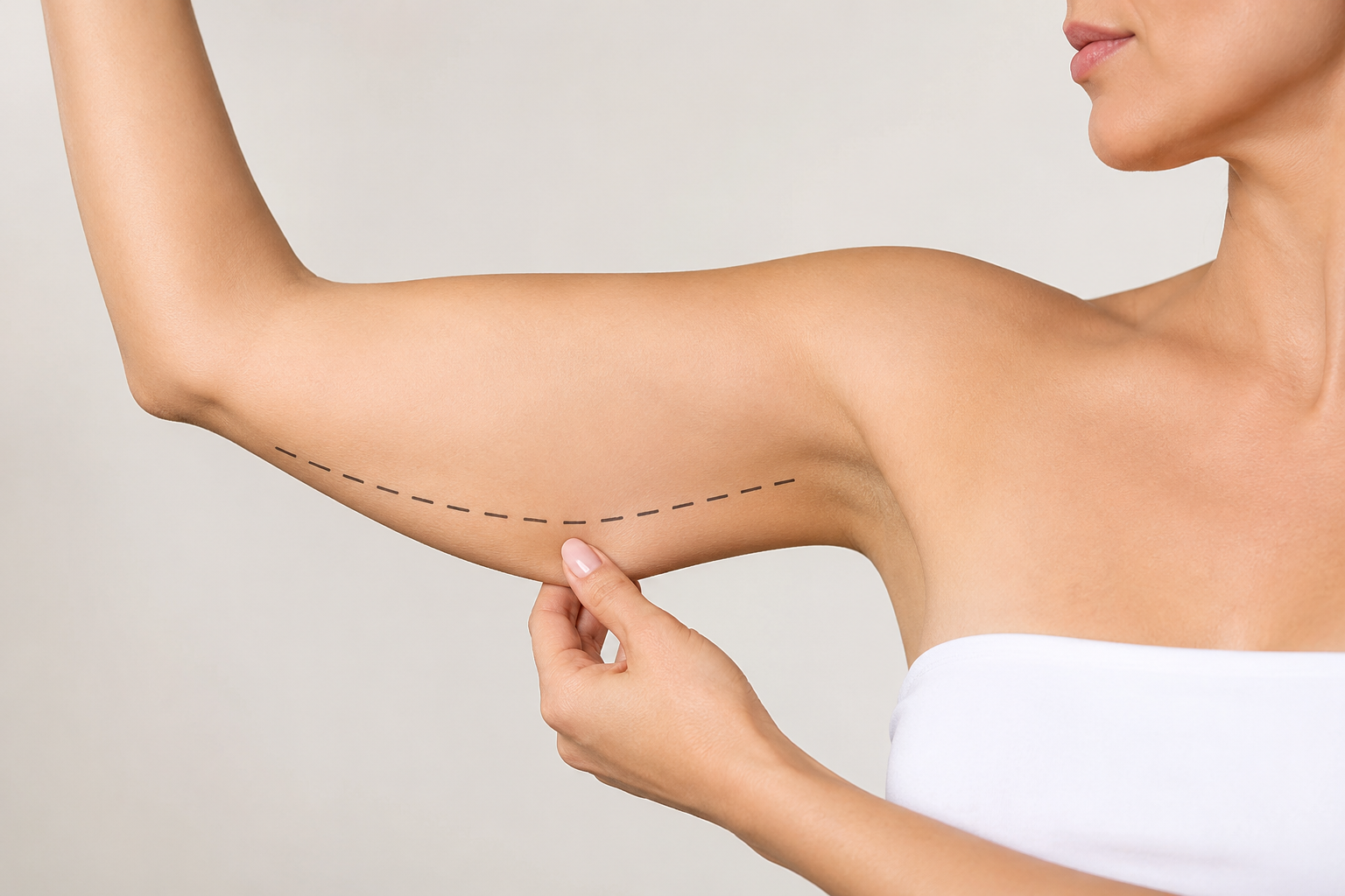 Woman with contoured waist and abdomen representing awake liposuction at VENUS MD in Orange County